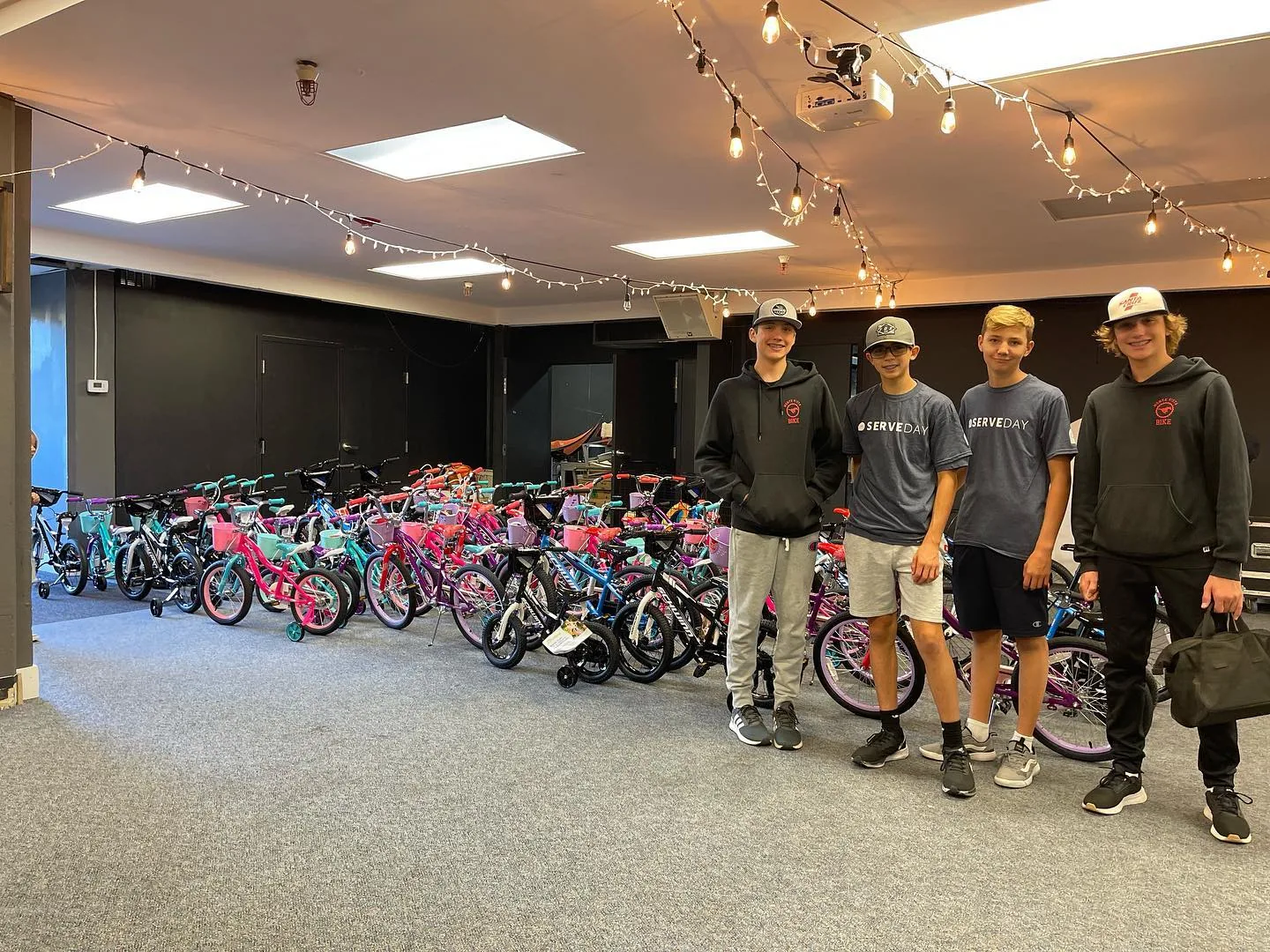 Volunteers with assembled bicycles at the October 2022 CPC Danville bike-build event