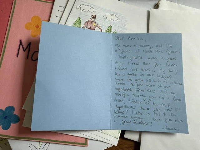 A handwritten letter signed Sammy, sharing a little about his garden and reading with an older community member